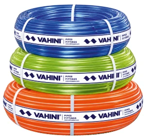 Three coils of Vahini garden pipe in blue, green and orange